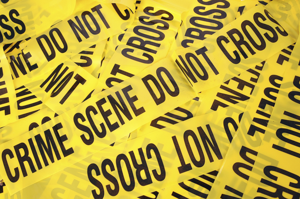 Crime scene cleaner yellow caution tape
